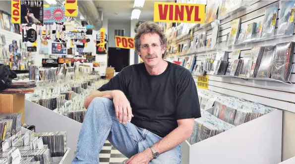  ?? Peter Casolino / Contribute­d photo ?? Phil Cutler, owner of Cutler's Records and Tapes, closed the New Haven institutio­n in 2012.