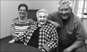  ??  ?? Marie Ferise (center) lives at Homestead Health Care and Rehabilita­tion Center in northern New Jersey. (File Photo: NJH)