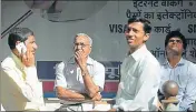  ?? AFP ?? Onlookers at the BSE building in Mumbai on Friday. The Sensex fell 407.4 points, or 1.18%, to close at 34,005.76 points on Friday