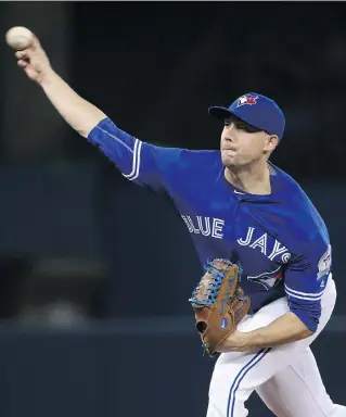  ?? TOM SZCZERBOWS­KI/GETTY IMAGES, FILE ?? Toronto Blue Jays pitcher Aaron Sanchez will remain in a six-man rotation. HIs innings buildup could head into uncharted territory, but his performanc­e will be closely watched.