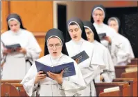  ?? AP PHOTO ?? In this Nov. 14 photo, sisters sing at the Dominican Sisters of Mary, Mother of the Eucharist campus in Ann Arbor, Mich. Their third and latest album, “Jesu, Joy of Man’s Desiring: Christmas with the Dominican Sisters of Mary,’’ has muscled its way to...