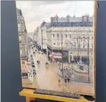  ?? JONATHAN PETROPOLOU­S/THE ASSOCIATED PRESS/FILES ?? Camille Pissarro’s 1897 masterpiec­e Rue St.-Honore, Apres-Midi, Effet de Pluie is the subject of a battle to determine rightful ownership.