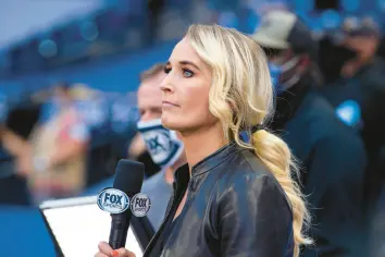 ?? ZACH BOLINGER/AP ?? Fox Sports sideline reporter Sarah Kustok prepares for a postgame interview during a game between the Colts and Vikings on Sept. 20, 2020, in Indianapol­is.