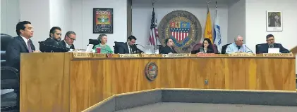  ??  ?? From left, Councilors Joe Maestas, Ron Trujillo, Mike Harris, Mayor Pro Tem Signe Lindell, Mayor Javier Gonzales, Councilor Carmichael Domiguez, and Councilors Renee Villarreal, Peter Ives and Chris Rivera. The new mayoral system will give the mayor...