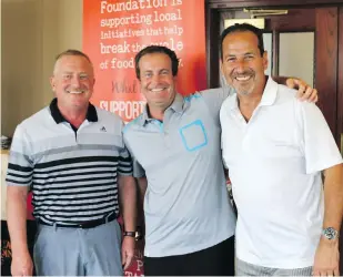  ??  ?? Second place tournament winners, from left, are Bart Willmore, vice-president, human resources, Calgary Co-op; Kevin McLean, account manager, Westkey Graphics; and Alfir Karmal, president and chief executive officer, Westkey Graphics.