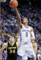  ?? JAMES CRISP — THE ASSOCIATED PRESS ?? Kentucky’s Quade Green (0) shoots near Centre’s Zach Schmucker during the second half of an NCAA college basketball exhibition game, Friday in Lexington, Ky.