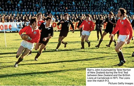  ?? ?? Barry John is pursued by Tane Norton of New Zealand during the first Test between New Zealand and the British Lions at Carisbrook in 1971. The Lions won the match 9-3.
Picture: Getty Images