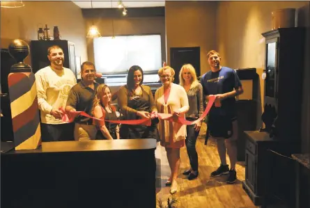  ?? Ben Lambert / Hearst Connecticu­t Media ?? Torrington hair salon business, Staches and Lashes, was celebrated last week with a ribbon-cutting ceremony.