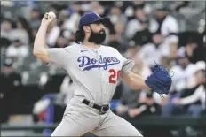  ?? CHARLES REX ARBOGAST/AP ?? LOS ANGELES DODGERS STARTING PITCHER TONY GONSOLIN delivers during the first inning of the team’s game against the Chicago White Sox on Wednesday in Chicago.