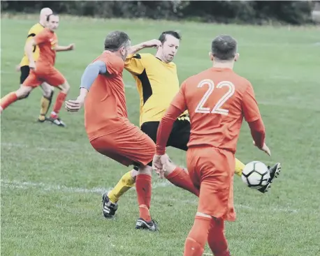  ??  ?? Ivy Legends Over-40s (yellow kit) taking on Seaton Buildings Over-40s at Hylton Road, Sunderland, on Saturday
