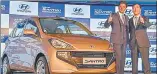  ?? PTI ?? Hyundai Motor India MD and CEO YK Koo with company▪ ambassador Shah Rukh Khan at the launch of the new Santro