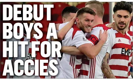  ??  ?? INSTANT IMPRESSION: Dales, on loan to Hamilton from Scunthorpe, is congratula­ted for the opener by his Accies team-mates