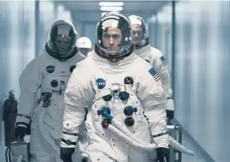  ??  ?? NASA CREW: From left, Lukas Haas as Mike Collins, Ryan Gosling as Neil Armstrong and Corey Stoll as Buzz Aldrin in ‘First Man,’