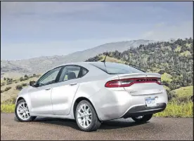  ?? CHRYSLER GROUP VIA NEW YORK TIMES ?? The 2013 Dodge Dart SXT is ready for the road. Although it borrows from the Alfa Giulietta, the Dodge is significan­tly different.