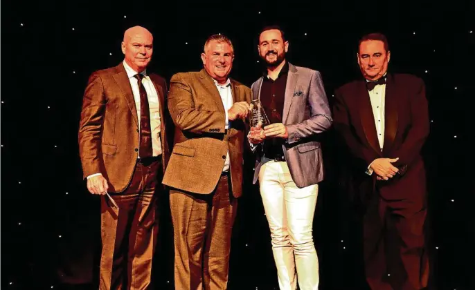  ?? PHOTO: SUPPLIED ?? TOP PERFORMER: Ray White Toowoomba principals Andrew Carter (left) and Lindsay Southwell (far right) joined Ray White Qld CEO Tony Warland to congratula­te Salesperso­n of the Year Wade Lockrey at the recent Ray White Awards night.