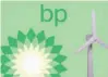  ?? — Reuters ?? 3D printed windmill is seen in front of displayed BP logo in this illustrati­on picture.