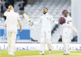  ?? Picture / AP ?? West Indies batsman Shai Hope celebrates after scoring the winning runs in the second test against England.