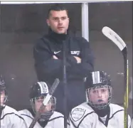  ?? Emily J. Reynolds / For Hearst Connecticu­t Media ?? Xavier High School boys hockey head coach Nick Costanzo is seen on the bench during the game at Wesleyan University against Hamden High School on Dec. 19. Constanzo was let go on Thursday by Xavier.