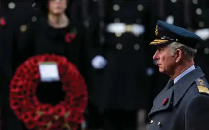  ?? JACK TAYLOR, GETTY IMAGES ?? Prince Charles leads the annual Remembranc­e Sunday memorial in London in place of the Queen.