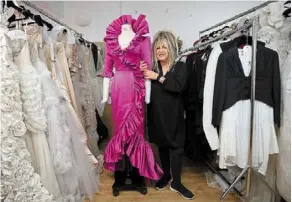  ?? ?? Fashion forward: emanuel with a replica of the evening gown she designed for diana before her marriage in 1981. — ap