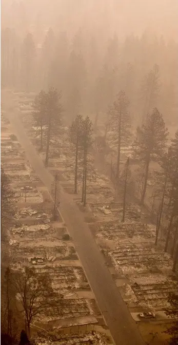  ??  ?? A burned neighbourh­ood in Paradise, Calif., on Nov. 15, 2018. The death toll in the deadliest wildfire in California’s recent history climbed to 85.