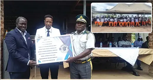  ?? ?? Assistant Commission­er Mutimbanyo­ka (right) and centre Nicholas Karikoga, (Insert) The inmates after graduating