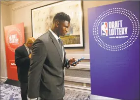  ?? Nuccio DiNuzzo / Associated Press ?? Duke’s Zion Williamson arrives for the NBA basketball draft lottery on Tuesday in Chicago.