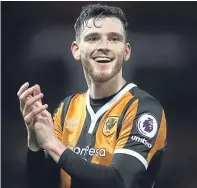  ?? Pictures: SNS Group/ Getty Images. ?? Andy Robertson, clockwise from top: during Saturday’s 2-2 draw with England at Hampden; in his days as a Dundee United player in 2014; and enjoying the moment after Hull City earned an Old Trafford draw with Manchester United in February.