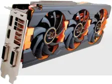  ??  ?? Sapphire Radeon R9 290 Tri-X OC New Edition: Die 305 Millimeter lange Grafikkart­e macht mit ihren drei Axial-Lüftern und dem mächtigen Kühlkörper eine kraftstrot­zende Figur, die durch die hohe Rechenleis­tung auch innere Bestätigun­g findet.