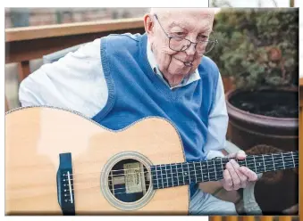  ?? (Terra Fondriest/The New York Times) ?? Gordon McCann plays at his home in Springfiel­d, Mo., on Jan. 22. In October, McCann quit making the hourlong trek to the McClurg, Mo., jam session because he got spooked by the coronaviru­s.