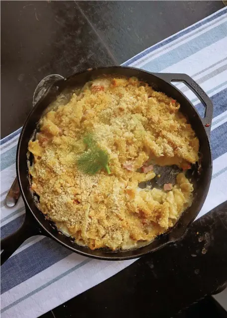  ?? ?? FANCY TOUCHES: Campanelle gratin gets a crunchy topping of parmesan cheese and panko bread crumbs.