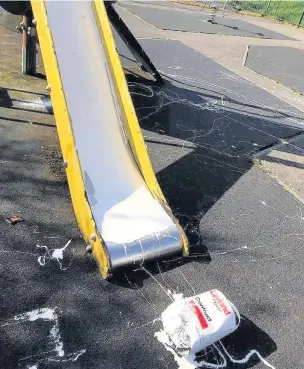  ??  ?? The slide in the park on Fairfield Avenue, Maesteg, was covered in paint by vandals