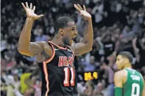  ?? LYNNE SLADKY/THE ASSOCIATED PRESS ?? Miami Heat’s Dion Waiters had 26 with a pair of big 3-pointers in the final minutes of Miami’s win over the Celtics on Wednesday in Miami. The Heat snapped Boston’s 16-game winning streak.