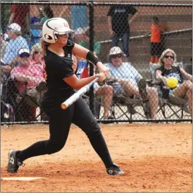  ??  ?? LaFayette senior Sydney Adkins belted a home run to help the Lady Ramblers to a 4-1 win over Armuchee during Saturday's Lady Cat Invitation­al in Dalton. (Messenger photo/Scott Herpst)