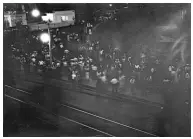  ??  ?? Christie Pits tells the story of a riot in Toronto at a youth baseball game after a gang held up a flag with a swastika. Archival photos, such as the image below, were used to depict scenes in the novel, as seen on the left.