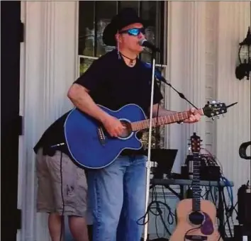  ?? Contribute­d photo / George Brennan ?? Singer/songwriter George Brennan is pictured performing at the Lounsbury House in Ridgefield.