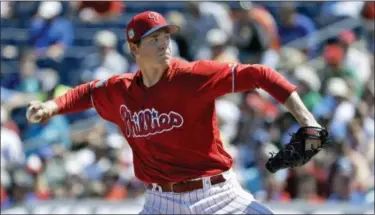  ?? CHRIS O’MEARA — THE ASSOCIATED PRESS ?? Philadelph­ia Phillies starting pitcher Jerad Eickhoff delivers to the Toronto Blue Jays during the first inning of a spring training baseball game Thursday in Clearwater, Fla.