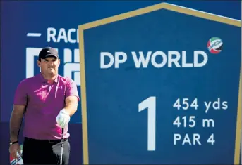  ?? GETTY IMAGES ?? Patrick Reed prepares to tee off on the first hole during the second round of the season-ending World Tour Championsh­ip in Dubai on Friday.