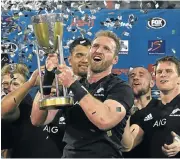  ?? /AFP ?? Simply the best: All Black captain Kieran Read hoists the Rugby Championsh­ip trophy in Buenos Aires.