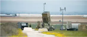  ??  ?? AN IRON DOME battery is deployed near the southern Gaza Strip. (Amir Cohen/Reuters)