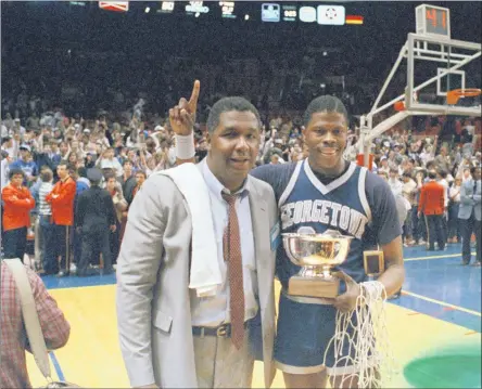  ?? THE ASSOCIATED PRESS ?? FILE - In this March 9, 1985, file photo, Georgetown NCAA college basketball head coach John Thompson poses with player Patrick Ewing after Georgetown defeated St. John’s in the Big East Championsh­ip in New York. John Thompson, the imposing Hall of Famer who turned Georgetown into a “Hoya Paranoia” powerhouse and became the first Black coach to lead a team to the NCAA men’s basketball championsh­ip, has died. He was 78 His death was announced in a family statement Monday., Aug. 31, 2020. No details were disclosed.