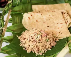  ??  ?? Mas huni is a Maldivian breakfast specialty of finely diced cooked tuna, coconut, chilli and red onion with added salt and lime juice.