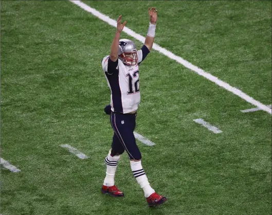  ?? EZRA SHAW, GETTY IMAGES ?? Tom Brady of the New England Patriots celebrates after James White scored a touchdown during overtime of Super Bowl LI at NRG Stadium in Houston on Sunday night. The Pats made a great comeback.