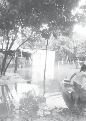  ?? Of Erwin Thompson) (Photo courtesy ?? Flood waters were also said to have affected St. Ignatius Village.
