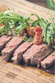  ??  ?? The grape-vine grilled Australian Angus rib-eye steak.