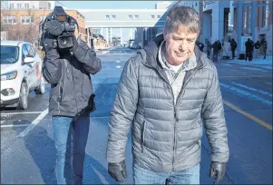  ?? CP PHOTO ?? Former federal MP Peter Stoffer heads from a news conference after addressing sexual harassment allegation­s in Halifax on Friday. Stoffer denied the claims but apologized for actions that might have been interprete­d as inappropri­ate.