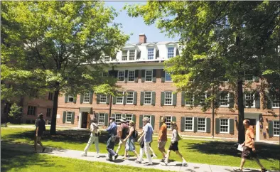  ?? Hearst Connecticu­t Media file photo ?? Visitors walk in front of Edwin McClellan Hall on Yale University's Old Campus during a Yale University Visitor Center walking tour of the Yale campus.