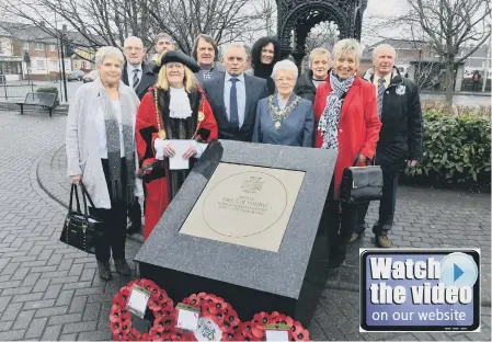  ??  ?? Private Thomas Young, left, and the commemorat­ive stone memorial with the Mayor and Mayoress of South Tyneside, Coun Olive Punchion and Mrs Mary French with Private Young’s family.