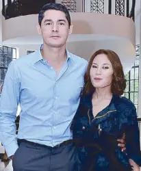  ??  ?? Rustan’s senior buyer for men’s division Paolo Lobregat and creative director for fashion Katrina Tantoco-Lobregat