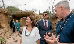  ?? JASON DORDAY/STUFF ?? Jenny Morrison, the Australian prime minister’s wife, and Clarke Gayford, partner of New Zealand Prime Minister Jacinda Ardern, with Auckland Zoo marketing manager Jooles Clements at Auckland Zoo.